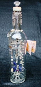 Brillare - a Pixie surrounded by shiny things - in her bottle.